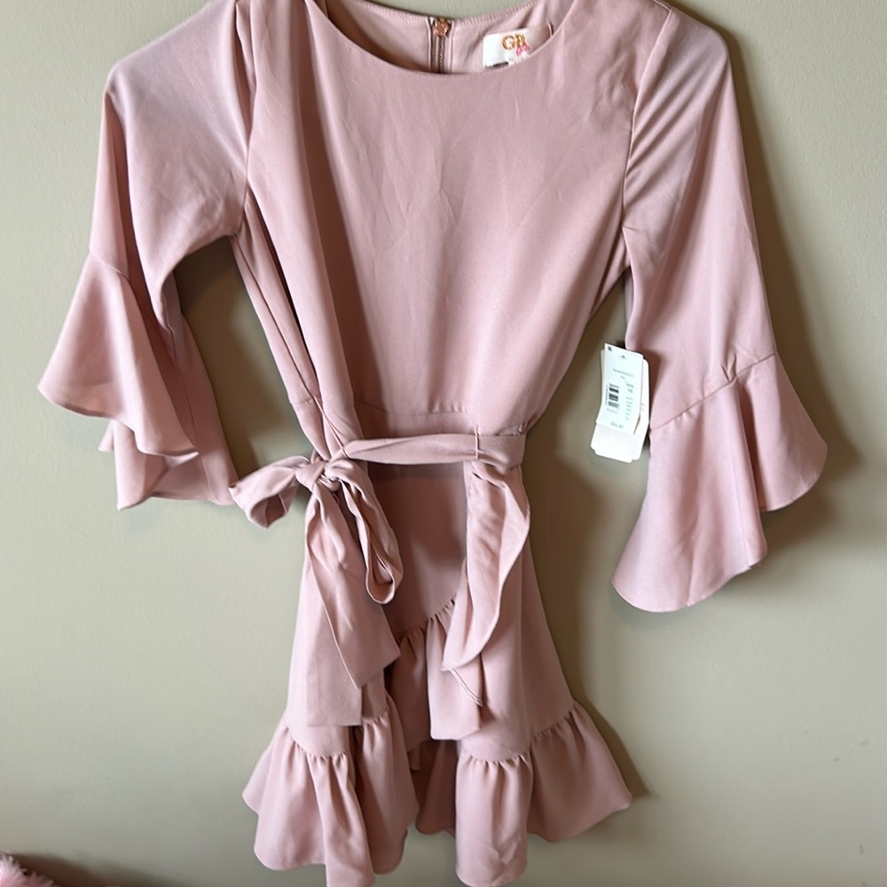 Pink dress with zipper.     NEW WITH TAGS